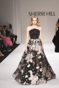 Model walks runway for Sherri Hill Autumn/Winter 2018 runway at New York Fashion Week at Gotham Hall